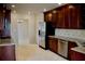 Kitchen featuring stainless steel appliances, granite counters and custom wood cabinets at 8761 The Esplanade # 6, Orlando, FL 32836