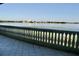 Stunning lake view framed by a tiled balcony and elegant balustrade, creating an inviting outdoor space at 8761 The Esplanade # 6, Orlando, FL 32836