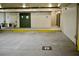 This parking garage features clearly marked parking spots and reserved spaces for residents' convenience at 8761 The Esplanade # 6, Orlando, FL 32836