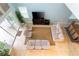 Spacious living room with tile floors, comfortable sofas, and ample natural light from large windows at 9004 Majesty Palm Rd, Kissimmee, FL 34747