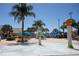 The splash pad includes water features with a lounge area shaded by umbrellas at 9004 Majesty Palm Rd, Kissimmee, FL 34747