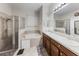 Bright bathroom featuring a soaking tub, glass enclosed shower and double sink vanity at 925 Counts Crest Cir, Apopka, FL 32712