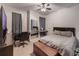 Comfortable bedroom features a bed, desk, mirror and closet for optimal convenience at 925 Counts Crest Cir, Apopka, FL 32712