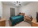 This bedroom features a bookshelf and a desk at 925 Counts Crest Cir, Apopka, FL 32712