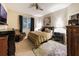 This bedroom has neutral colors and comfortable furniture at 925 Counts Crest Cir, Apopka, FL 32712