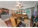 Inviting living room with open layout, seamlessly connecting the kitchen, dining area, and cozy seating arrangement at 925 Counts Crest Cir, Apopka, FL 32712