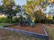 This park playground has a slide and nearby benches at 925 Counts Crest Cir, Apopka, FL 32712