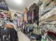 Spacious walk-in closet with ample storage space and plenty of hanging racks at 925 Counts Crest Cir, Apopka, FL 32712