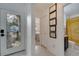 Bright foyer featuring decorative glass front door leading to bedroom and bathroom at 9736 Heron Pointe Dr, Orlando, FL 32832