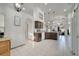 Bright kitchen featuring pendant lighting, granite countertops, and white appliances at 9736 Heron Pointe Dr, Orlando, FL 32832