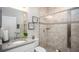 This is a stylish bathroom with a glass enclosed shower, granite counters, and updated cabinets at Tbd Royal Trails Rd, Eustis, FL 32736