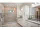 The bathroom features a tiled shower, granite counters, and updated cabinets at Tbd Royal Trails Rd, Eustis, FL 32736