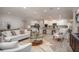 Bright and open living area featuring modern furniture, and an open-concept flow to the kitchen and dining space at Tbd Royal Trails Rd, Eustis, FL 32736