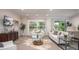 Bright living room with cozy seating, lots of natural light, and elegant decor at Tbd Royal Trails Rd, Eustis, FL 32736