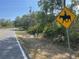 Signage showing horse crossing the road near a large property at Tbd Royal Trails Rd, Eustis, FL 32736
