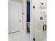Modern bathroom with a glass-enclosed shower featuring marble tile and matte black hardware at 10215 Park Estates Ave, Orlando, FL 32836