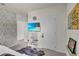 Bedroom features a television, gaming accessories, and fun wallpaper at 1068 Brooklet Dr, Davenport, FL 33837