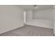 Spacious upstairs hallway with neutral paint and carpet at 1068 Brooklet Dr, Davenport, FL 33837