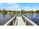 Picturesque view from the dock, showcasing serene lake views and surrounding greenery at 107 Coveridge Ln, Longwood, FL 32779