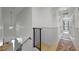 Bright hallway featuring modern finishes, stylish runners, and access to various rooms at 107 Coveridge Ln, Longwood, FL 32779