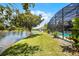 Beautiful waterfront view of backyard, including pool and dock at 107 Coveridge Ln, Longwood, FL 32779