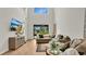 Spacious living room with soaring ceilings and large windows at 1090 Wildmeadow Run, Winter Park, FL 32792