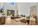 Comfortable living room with modern decor, ample seating, and lots of natural light at 1090 Wildmeadow Run, Winter Park, FL 32792