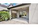 Covered patio with ceiling fan, privacy screen and view of outdoor foliage at 1090 Wildmeadow Run, Winter Park, FL 32792