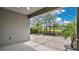Spacious screened-in patio with brick flooring and peaceful outdoor views at 1090 Wildmeadow Run, Winter Park, FL 32792