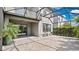 Large screened-in patio showcasing outdoor living with seating area and lush landscaping at 1090 Wildmeadow Run, Winter Park, FL 32792