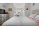Bright bedroom with a study area, featuring a comfortable bed and colorful wall decor at 1121 Blue Jay Dr, Davenport, FL 33837