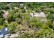 Sprawling wooded acreage with a view of luxury homes at 120 W Trade Winds Rd, Winter Springs, FL 32708