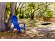 Backyard retreat with relaxing swing and chair at 120 W Trade Winds Rd, Winter Springs, FL 32708