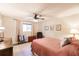 Relaxing bedroom offers a ceiling fan and a light color palette, creating a calm atmosphere at 120 W Trade Winds Rd, Winter Springs, FL 32708