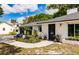 Inviting home with pretty landscaping and a two-car garage at 120 W Trade Winds Rd, Winter Springs, FL 32708