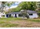 Inviting one-story home with an attached garage at 120 W Trade Winds Rd, Winter Springs, FL 32708