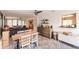 Spacious sunroom with dining area, dresser, and seamless transition into the living area at 120 W Trade Winds Rd, Winter Springs, FL 32708