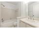 The bathroom features a shower-tub combo, toilet, and vanity at 1230 Westside Dr, Winter Garden, FL 34787