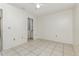 This bedroom has tiled floors and neutral walls at 1230 Westside Dr, Winter Garden, FL 34787