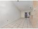 Open living room area featuring tile floors and sliding glass doors to the outside at 1230 Westside Dr, Winter Garden, FL 34787