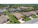 A peaceful neighborhood provides a serene backdrop to this home with beautifully landscaped lawns at 12711 Se 97Th Terrace Rd, Summerfield, FL 34491