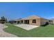 Property featuring an expansive lawn and open patio space, perfect for outdoor gatherings at 12711 Se 97Th Terrace Rd, Summerfield, FL 34491