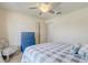 Bright bedroom featuring a ceiling fan and neutral decor, ideal for relaxation at 12711 Se 97Th Terrace Rd, Summerfield, FL 34491