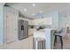 Well-appointed kitchen with stainless steel appliances and ample counter space at 12711 Se 97Th Terrace Rd, Summerfield, FL 34491