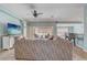 Cozy living room with comfortable seating and view of the outdoor patio at 12711 Se 97Th Terrace Rd, Summerfield, FL 34491