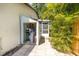 Exterior view of the shed in the backyard with storage shelves at 1303 Azalea Way, Winter Garden, FL 34787