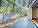 Lovely back yard with wood fence, patio, and lush landscaping at 136 Bridgeview Ct, Longwood, FL 32779