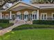 Community clubhouse featuring lovely architecture and landscaping at 136 Bridgeview Ct, Longwood, FL 32779