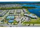 Expansive view of community amenities including tennis courts, playground, clubhouse, pool, and lush landscaping at 13828 Tybee Beach Ln, Orlando, FL 32827
