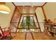 Loft area offering a view of the living room, with wood ceilings and beams at 14143 Conifer Dr, Orlando, FL 32832